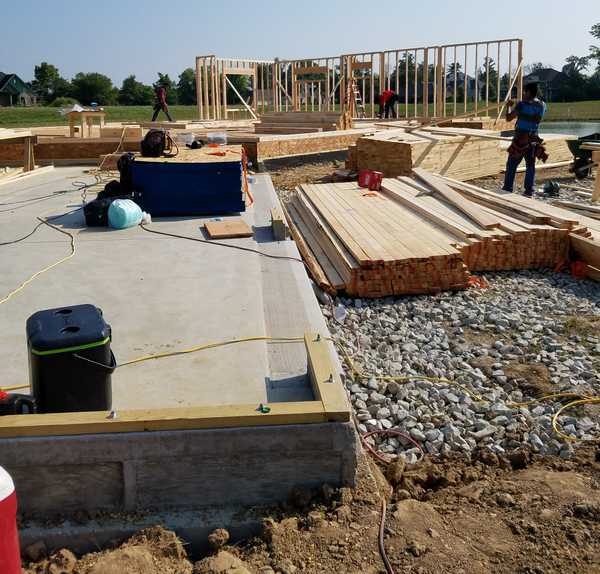 Construction Crew Framing a House 